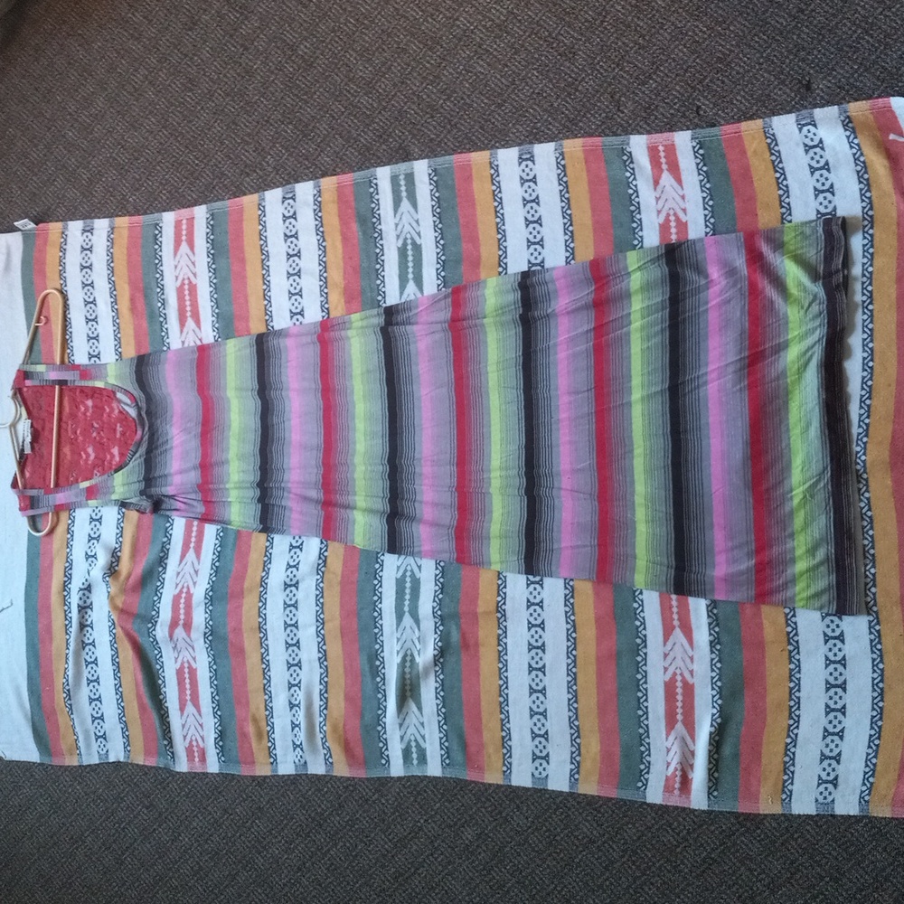 A colorful striped dress with a red lace back. It's a medium.